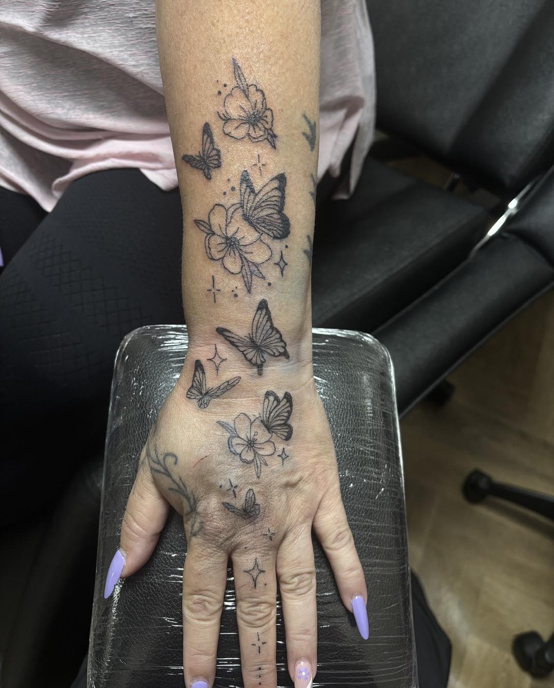 Butterflies and blossoms wrist piece